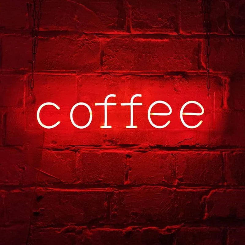 Letrero de neón “coffee” con luz roja en letras retroiluminadas