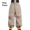 Pantalones de esquí holgados resistentes al desgaste para hombre, pantalones de invierno con bolsillos sueltos aislados para mujer, ropa impermeable para deportes al aire libre, cálida 2025