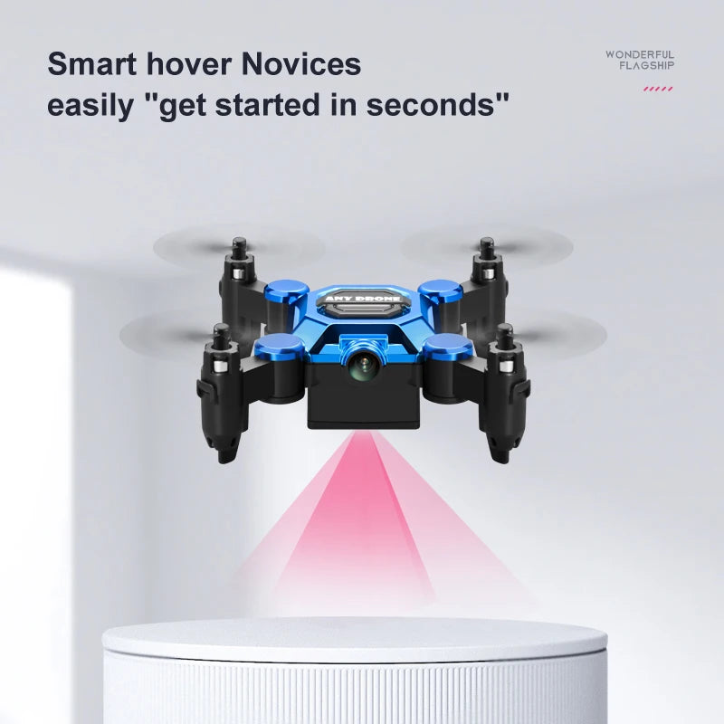 Dron mini plegable azul con cámara, vista frontal y hélices desplegadas sobre base