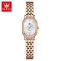 Reloj de pulsera para mujer OLEVS de lujo, diseño ovalado con bisel de cristal, cuarzo delgado, correa de piel y acero, elegante reloj multicolor 5697