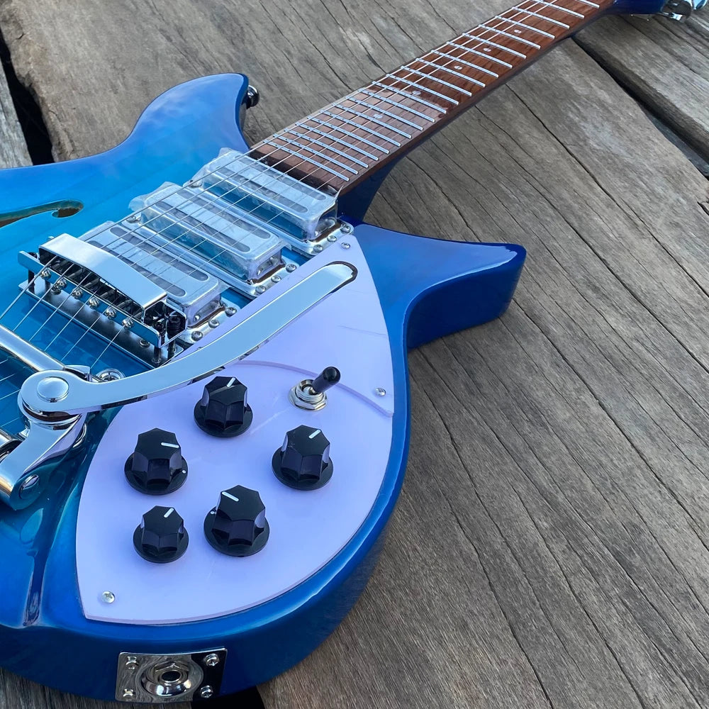 Guitarra Azul 325 con Puente Tremolo, Cuerpo Semi-Hueco con Orificios en Forma de F, Trastes de Acero Inoxidable, 3 Mini Humbuckers, Longitud de Escala de 20.75 Pulgadas, Nueva 2026