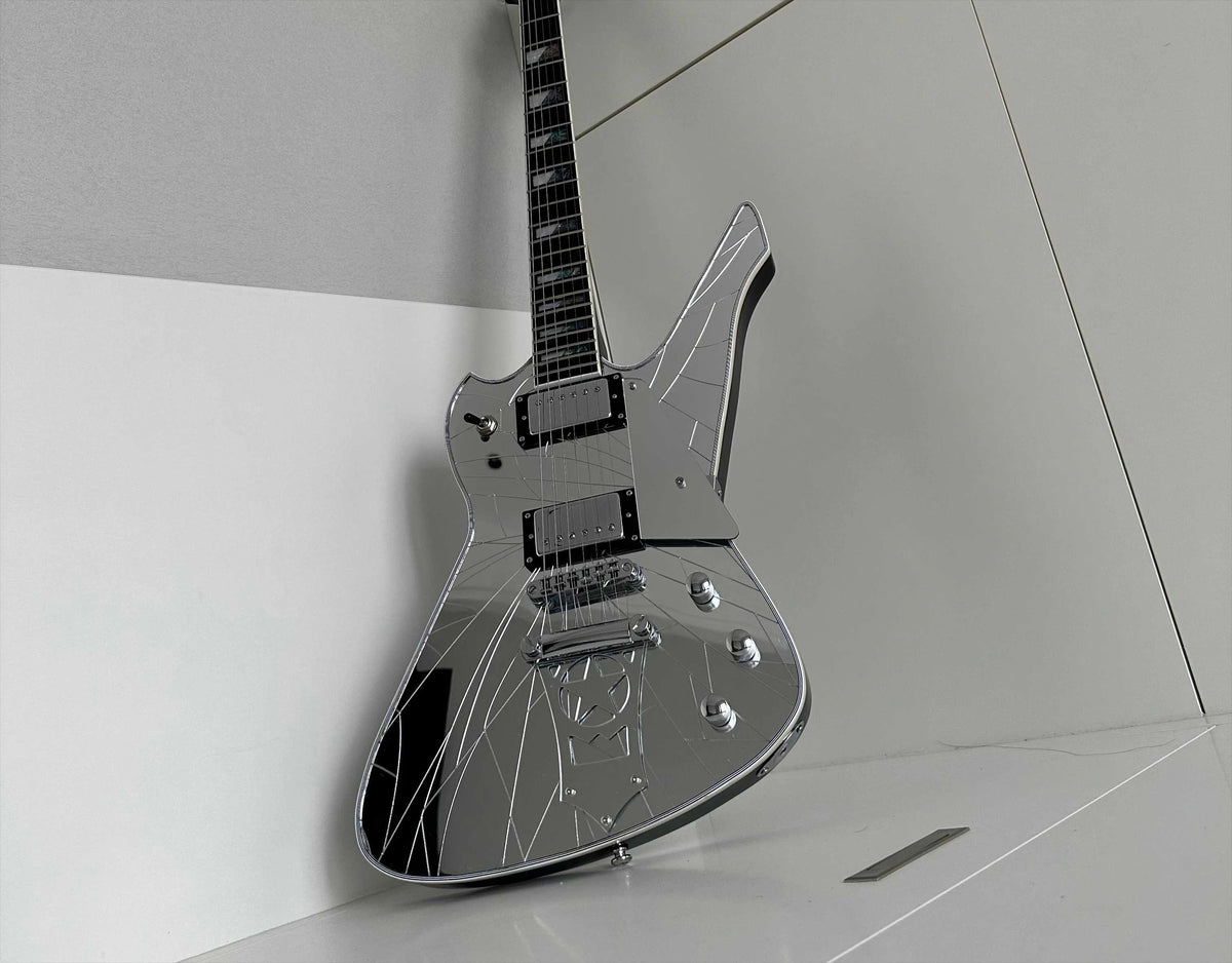 Guitarra eléctrica asimétrica, incrustaciones de perlas de abulón en forma de bloque dividido, cuerpo y tapa trasera con acabado espejado, protector de cuerdas con forma de estrella, pastillas HH.
