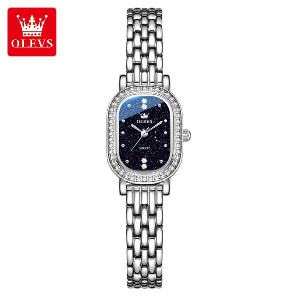 Reloj de pulsera para mujer OLEVS de lujo, diseño ovalado con bisel de cristal, cuarzo delgado, correa de piel y acero, elegante reloj multicolor 5697