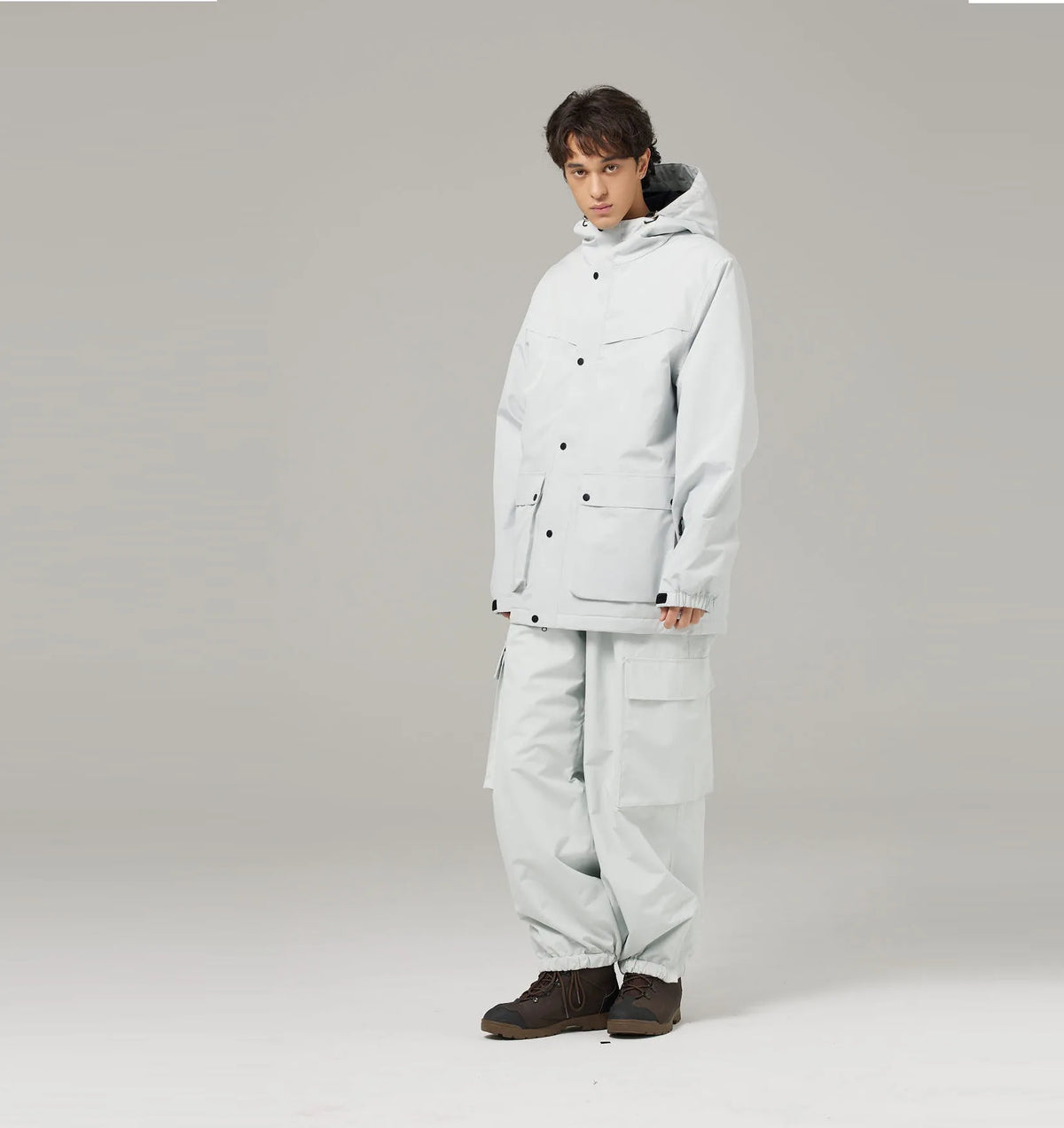 Mismos trajes de esquí de color sólido para hombres y mujeres, esquí de doble tabla y snowboard, versión súper suelta y de engorde al aire libre