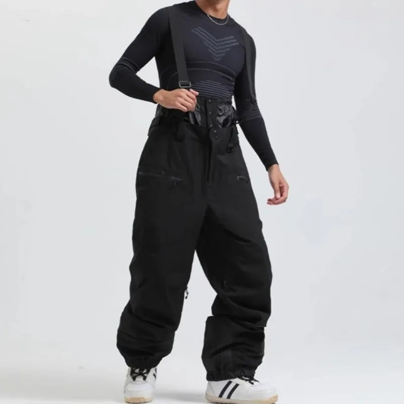 Pantalones de esquí con tirantes, unisex, para actividades al aire libre, resistentes al viento y a la nieve, cálidos, ideales para practicar snowboard, para hombres y mujeres, para esquí y deportes de invierno.