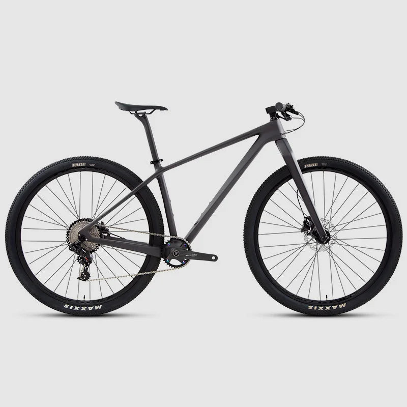 Bicicleta de montaña de 29 pulgadas con cuadro de fibra de carbono, horquilla de aleación de aluminio de alta calidad, 24 velocidades y frenos de disco hidráulicos comunes