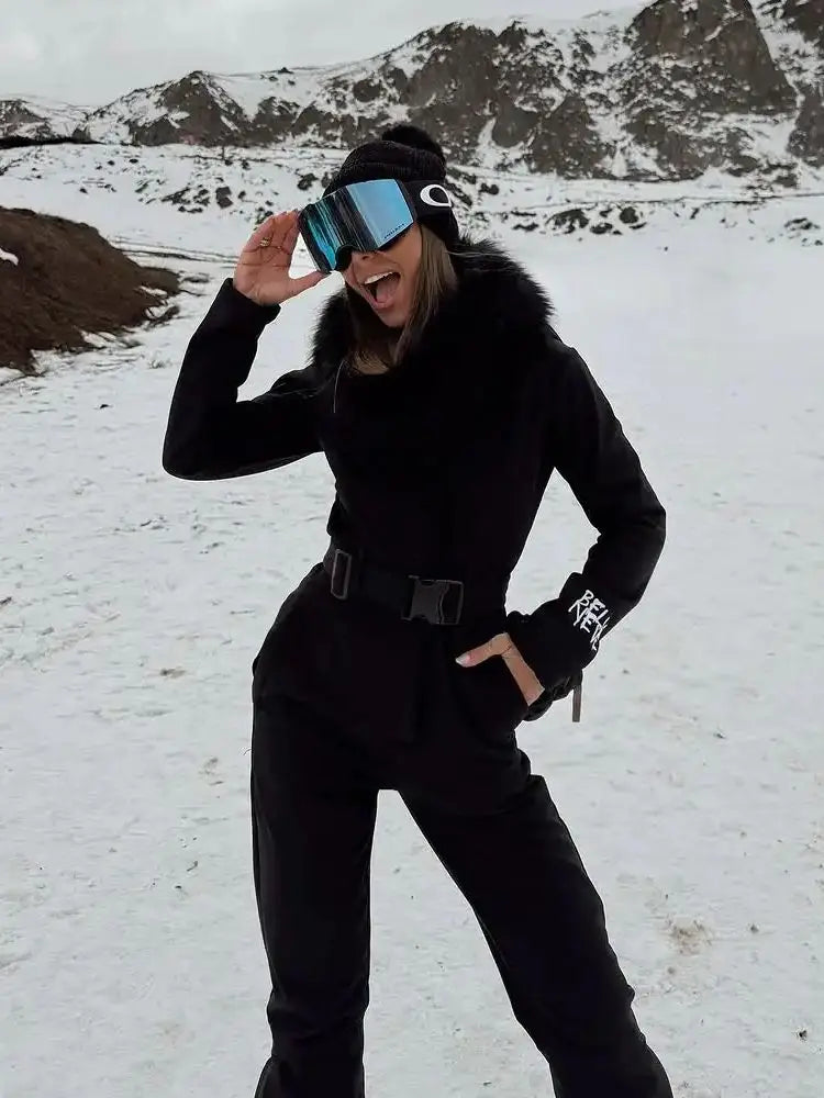 Ropa de esquí negra elegante con cuello levantado para mujer, mono ajustado de cintura alta con cintura de manga larga, mono cálido de invierno 2026