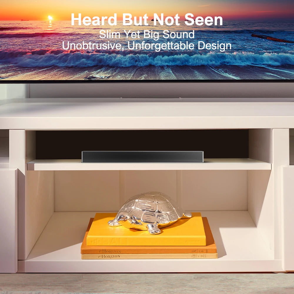 Barra de sonido negra integrada en mueble para TV, vista superior centrada.