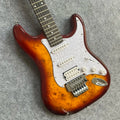 Guitarra de alta calidad con acabado Sunburst, incrustaciones de estrellas, sistema de trémolo y pastillas SSH 2026