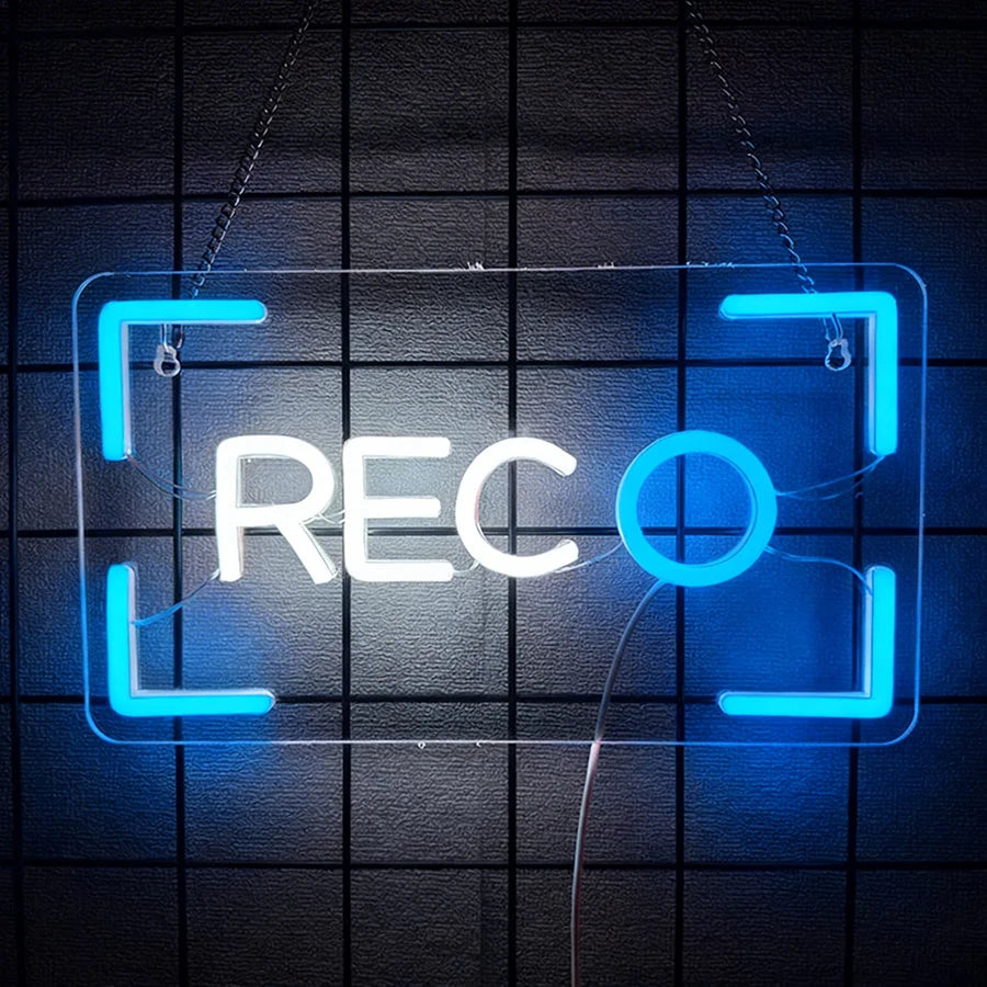 Letrero LED neón tipo cámara REC con marco azul y letras blancas, diseño de visor