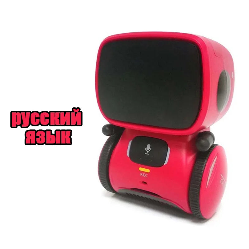 Robot educativo de cuerpo rojo con pantalla oscura y panel de micrófono negro