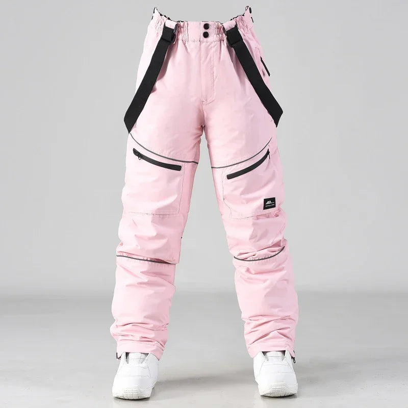 2024 deporte al aire libre hombre pantalones de esquí a prueba de viento mujeres pantalones de nieve montaña algodón Snowboard monos femeninos ropa impermeable