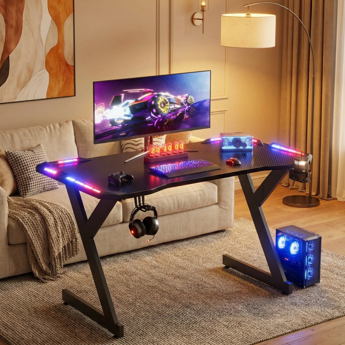 Escritorio gamer en forma de Y con superficie azul y luces RGB en los bordes