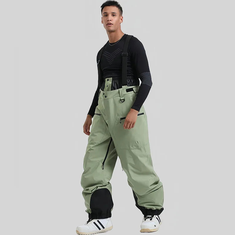 Nuevos pantalones de esquí para hombre, monos de esquí cálidos y gruesos para exteriores, pantalones de snowboard holgados impermeables a prueba de viento para nieve