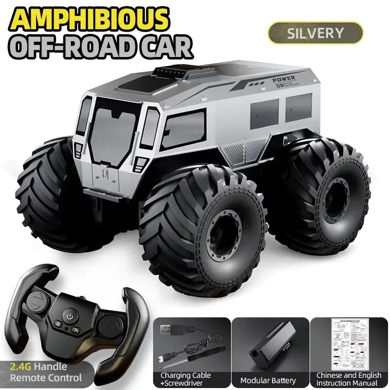 Coche RC anfibio plateado con cabina negra y ruedas grandes todo terreno.