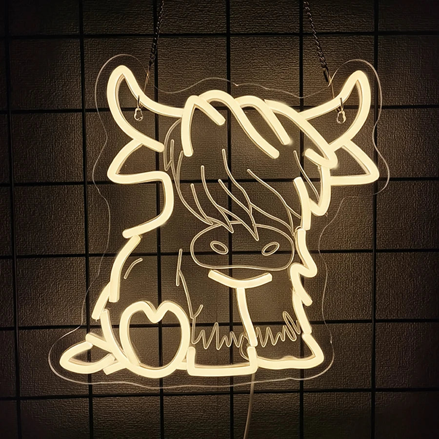 Señal LED de neón para pared con silueta de toro color crema, colgada con cadenas