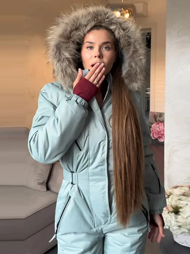 Mono de esquí de una pieza con capucha y parches de piel para mujer, estilo casual, con cinturón, manga larga, cierre de cremallera, mono liso, ropa de esquí para mujer, invierno 2026