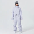Traje de esquí unisex de una sola pieza, holgado, impermeable, cálido, de tejido grueso, de color liso, mono para snowboard, ropa de invierno para esquiar al aire libre, para hombres y mujeres.