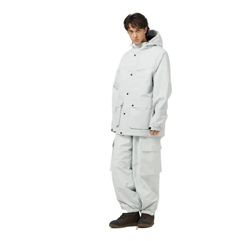 Mismos trajes de esquí de color sólido para hombres y mujeres, esquí de doble tabla y snowboard, versión súper suelta y de engorde al aire libre