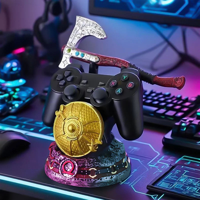 Soporte para controlador con mando negro y escudo dorado, figura con hacha plateada