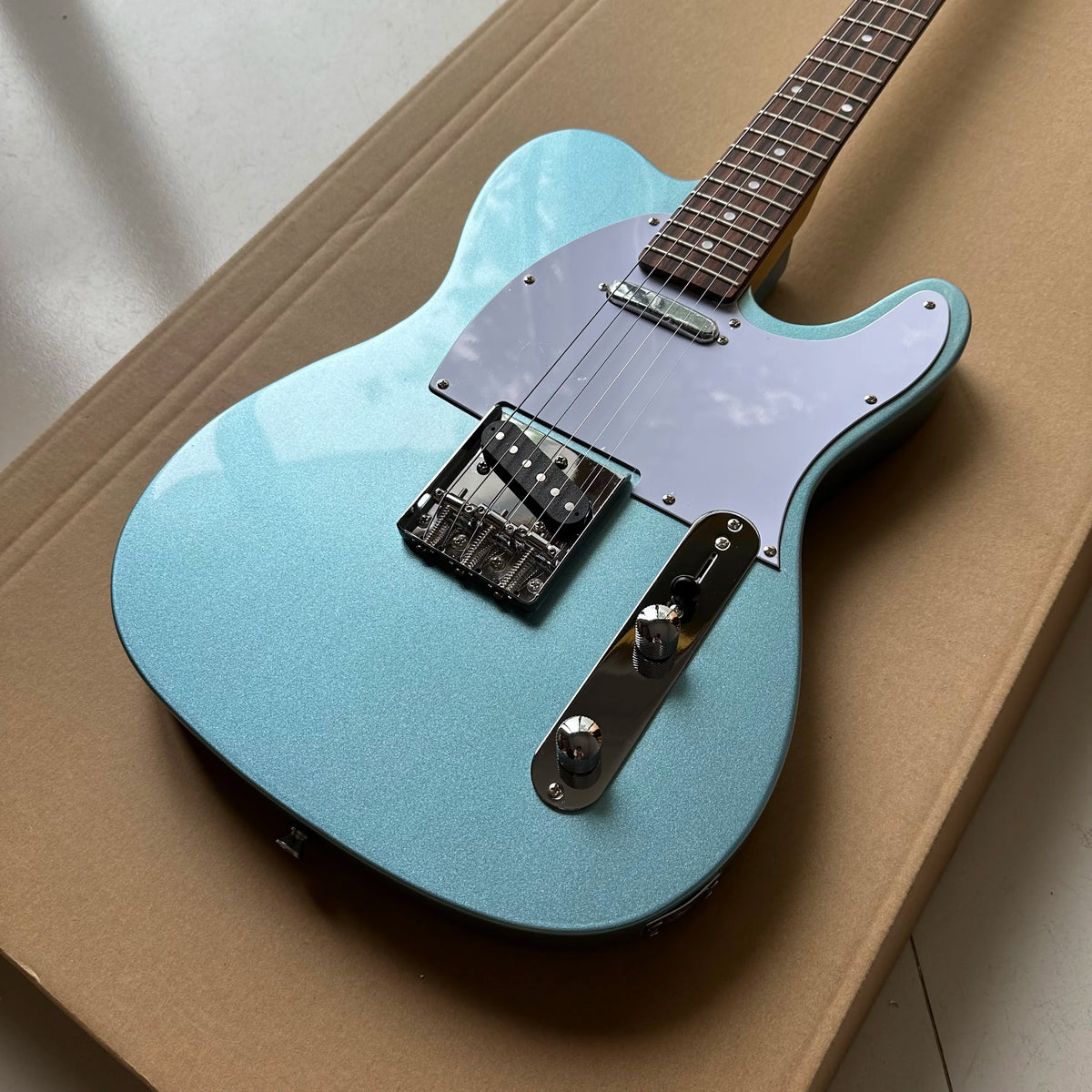 Guitarra Eléctrica Estilo TL, Diapasón de Palisandro, Cuerpo de Caoba, Color Azul Metálico