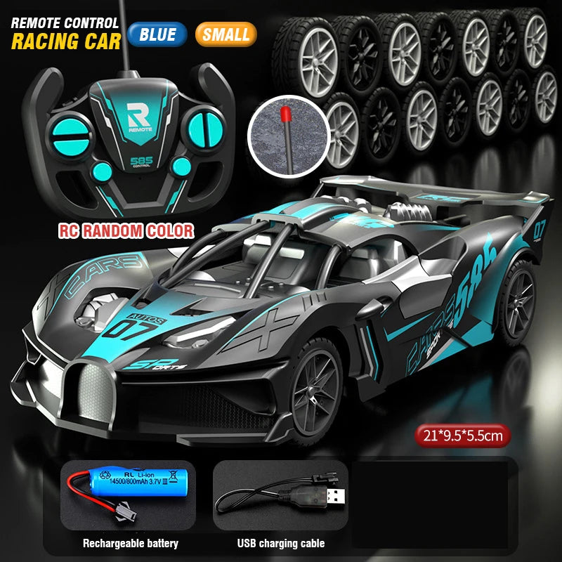 Carro RC teledirigido gris con detalles azules y verdes; mando negro y ruedas.