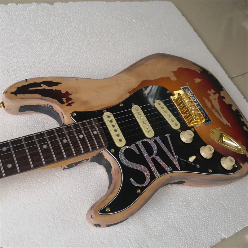 Guitarra eléctrica de 6 cuerdas para zurdos con acabado mate desgastado y pickguard negro, estilo vintage