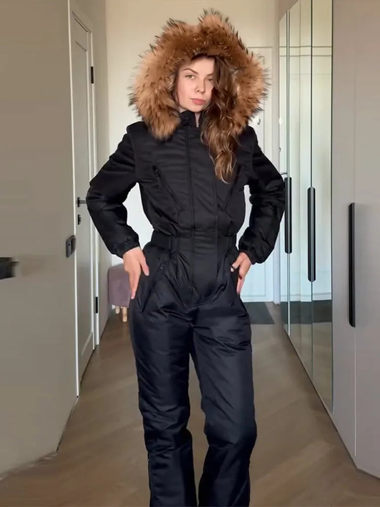 Elegante mono de esquí para mujer con capucha de piel, cremalleras gruesas y cintura ajustable, mono de esquí cálido para mujer, otoño-invierno 2026, nuevo.