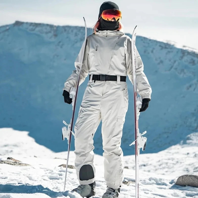 Trajes de esquí de una pieza para mujer 2026, monos de invierno aislados, impermeables, para snowboard, con cinturón y capucha, para actividades al aire libre
