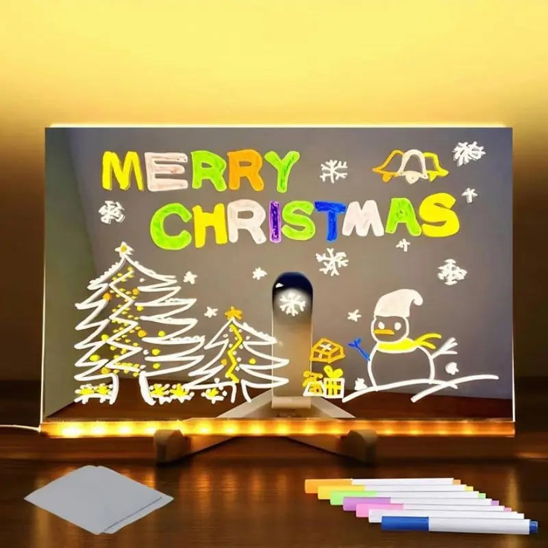 Pizarra LED de vidrio con «MERRY CHRISTMAS» y dibujos navideños en colores