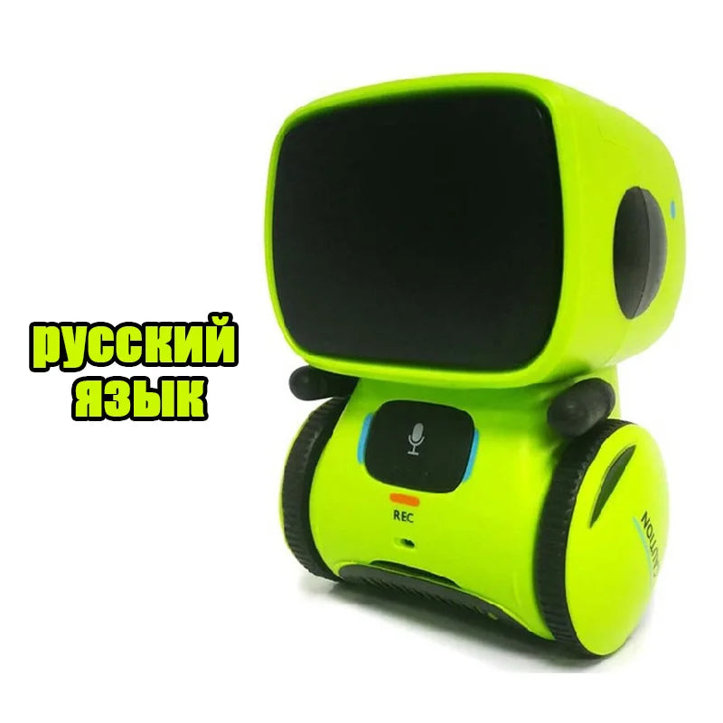 Robot educativo amarillo-verde con pantalla oscura y ruedas laterales negras