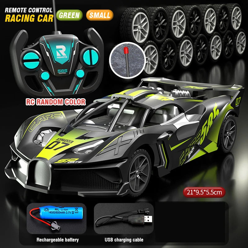 Carro RC teledirigido gris con detalles verdes; mando negro y rueda delantera visible.