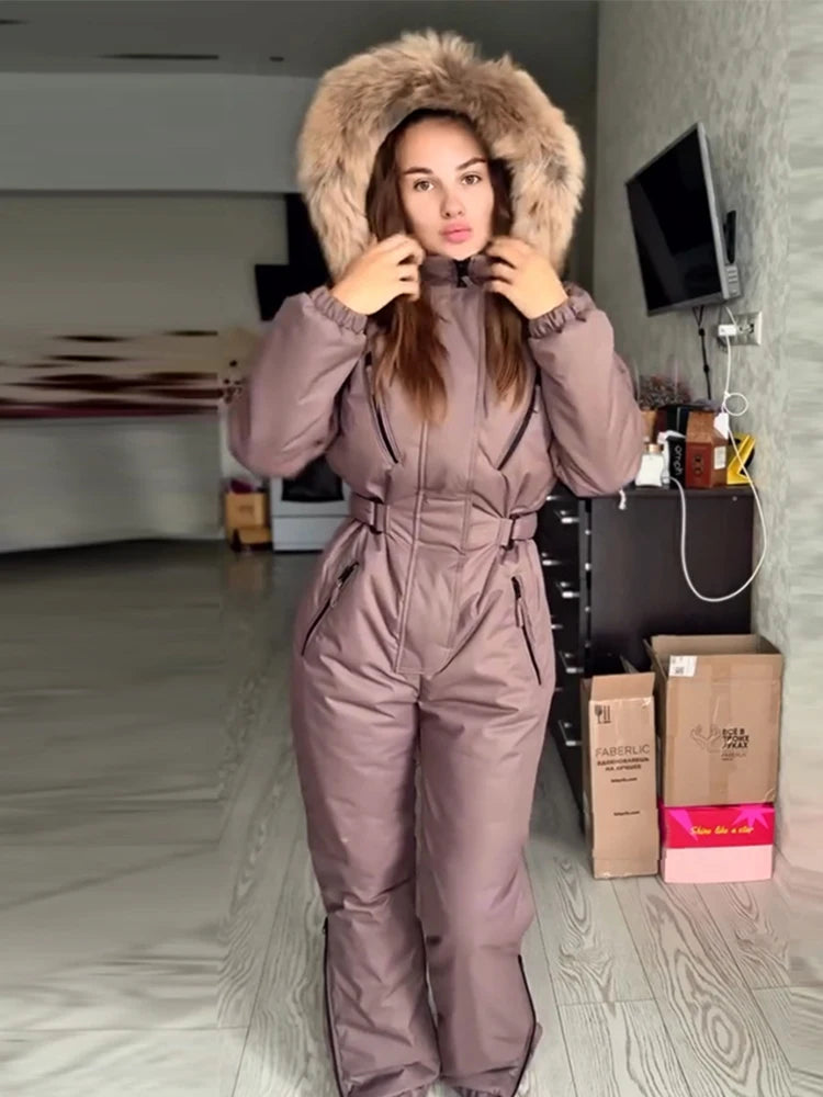 Elegante mono de esquí para mujer con capucha de piel, cremalleras gruesas y cintura ajustable, mono de esquí cálido para mujer, otoño-invierno 2026, nuevo.