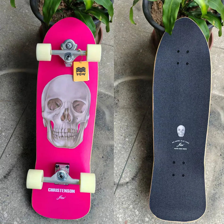Patineta de surf YOW Land, modelo CHRISTENSON, diseño de calavera naranja, 34 pulgadas, con laterales curvos dobles, calidad profesional.