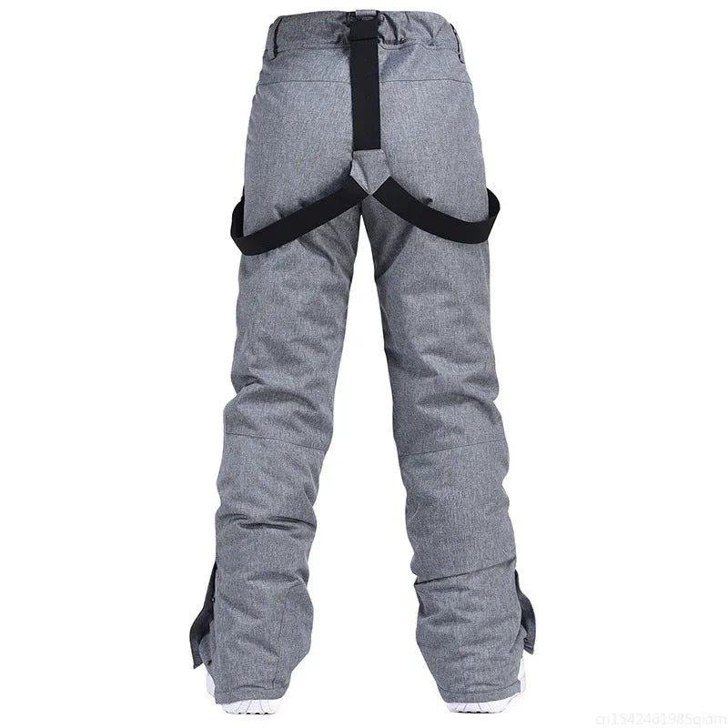 Pantalones de esquí para hombre y mujer, pantalones de esquí gruesos y cálidos de invierno, pantalones con tirantes impermeables a prueba de viento, pantalones de Snowboard de talla grande