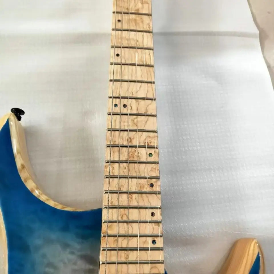 Tapa sólida de caoba de arce, 6 chapas de flores grandes, Color degradado azul y negro, nuevo cuerpo de madera de olmo sin cabeza, diapasón de guitarra eléctrica