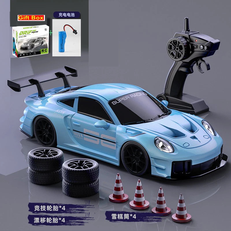 Coche RC de deriva 1:24 azul con control remoto y neumáticos, vista lateral
