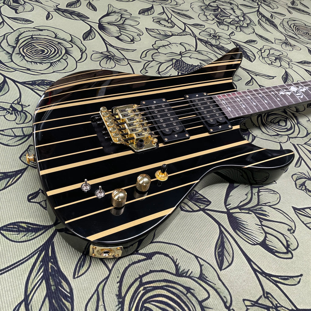 Guitarra eléctrica de 6 cuerdas con rayas negras y doradas, guitarra eléctrica con sistema de doble bloqueo y diapasón de palisandro, guitarra eléctrica para músico de rock