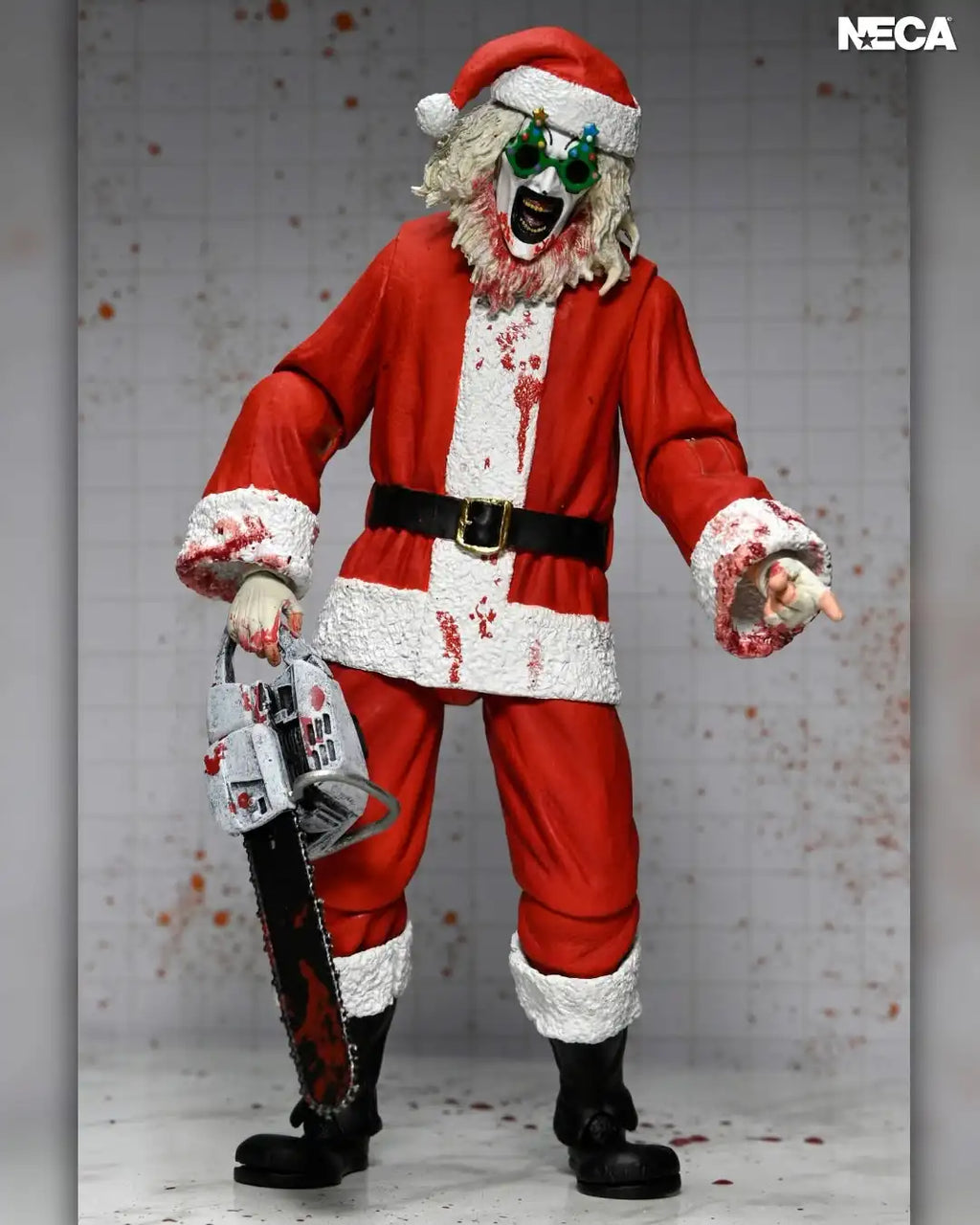 NECA Toys Terrifier 3 - Ultimate Bloody Santa Suit Art the Clown Figura de Acción a Escala 7 Pulgadas Modelo Muñeco Kit de Garaje
