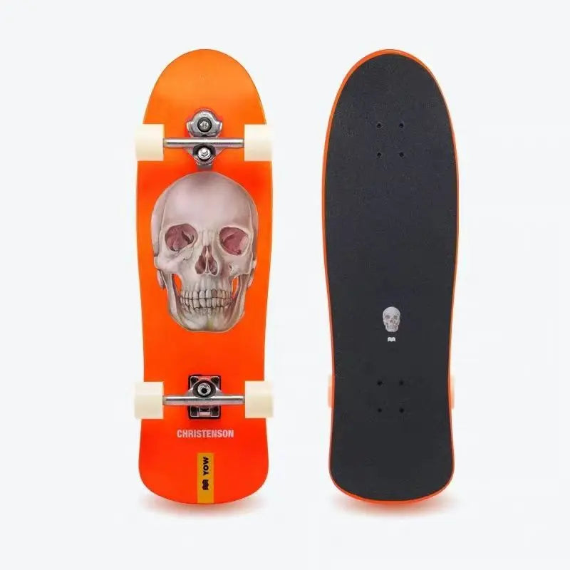 Patineta de surf YOW Land, modelo CHRISTENSON, diseño de calavera naranja, 34 pulgadas, con laterales curvos dobles, calidad profesional.