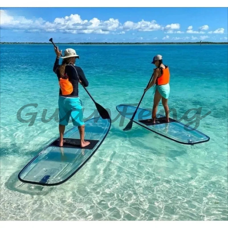 Tabla de paddle surf transparente con base transparente de material PC cristalino para deportes acuáticos.