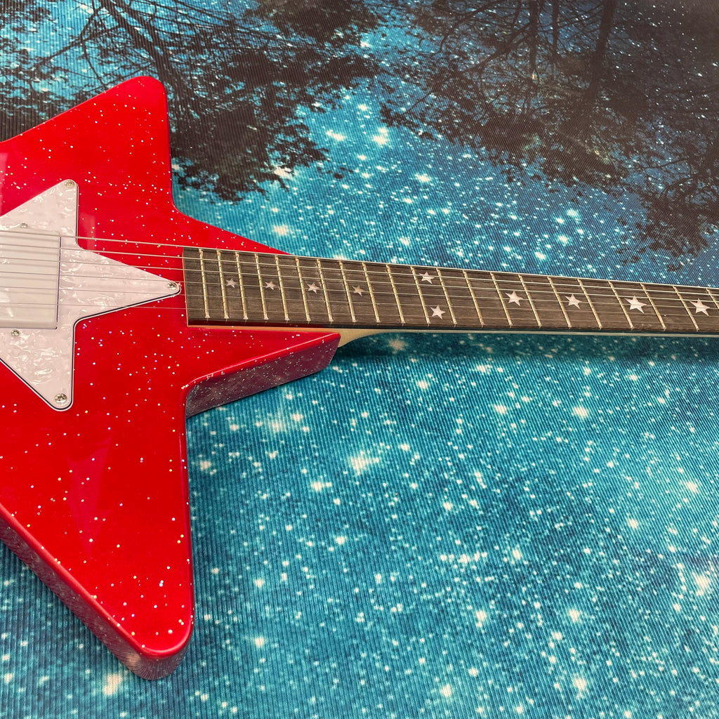 Guitarra eléctrica con forma de estrella de cinco puntas, guitarra con diapasón de palisandro, guitarra eléctrica con pastilla de bobina simple.