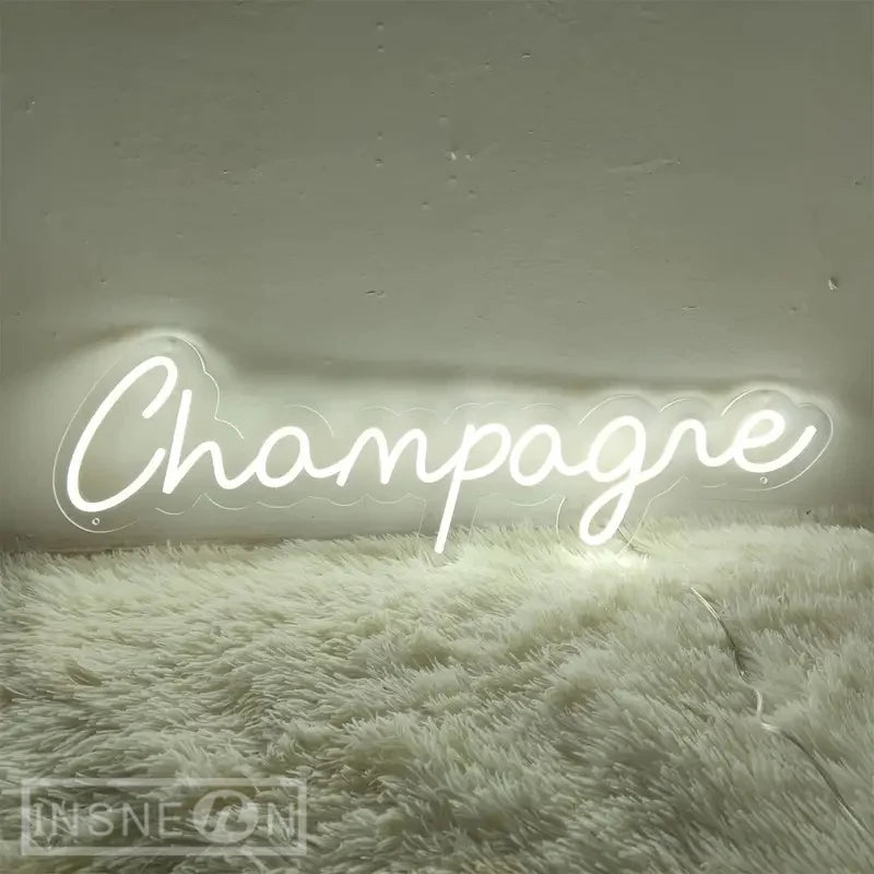 Letrero LED de neón “Champagne” en blanco frío, diseño tipo cursiva