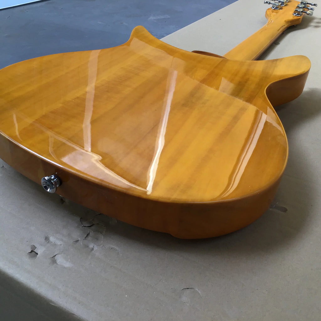 Guitarra eléctrica de 6 cuerdas con pastillas HHH, cuerpo de caoba, diapasón de palisandro, puente Floyd Rose y puente fijo, acabado amarillo translúcido
