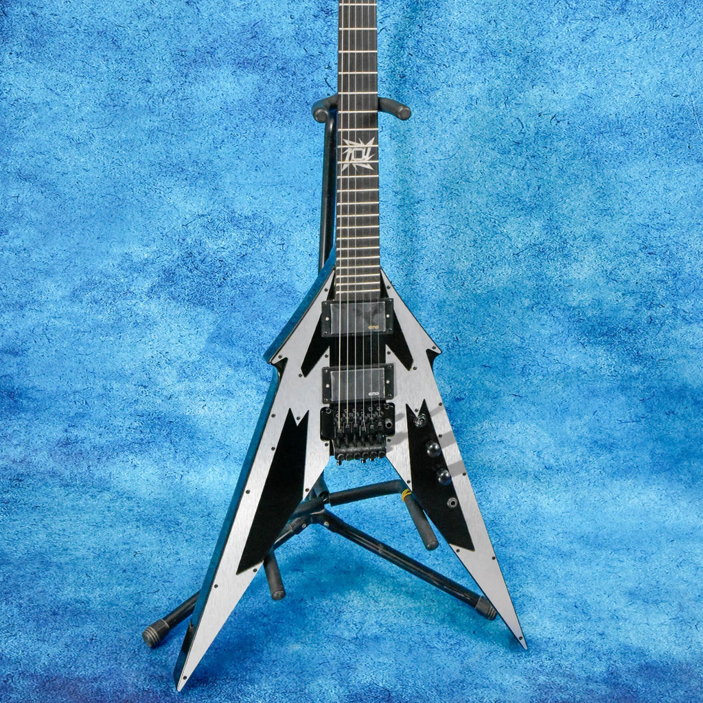 Guitarra eléctrica con forma en V, protector de cuerdas de aluminio cepillado, pastillas pasivas, trémolo con doble sistema de bloqueo, 24 trastes, 648 mm, nueva.