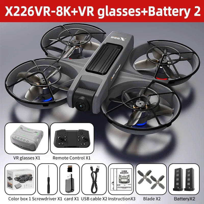 Mini dron cuadróptero gris con cuatro hélices y control remoto; con gafas VR y batería