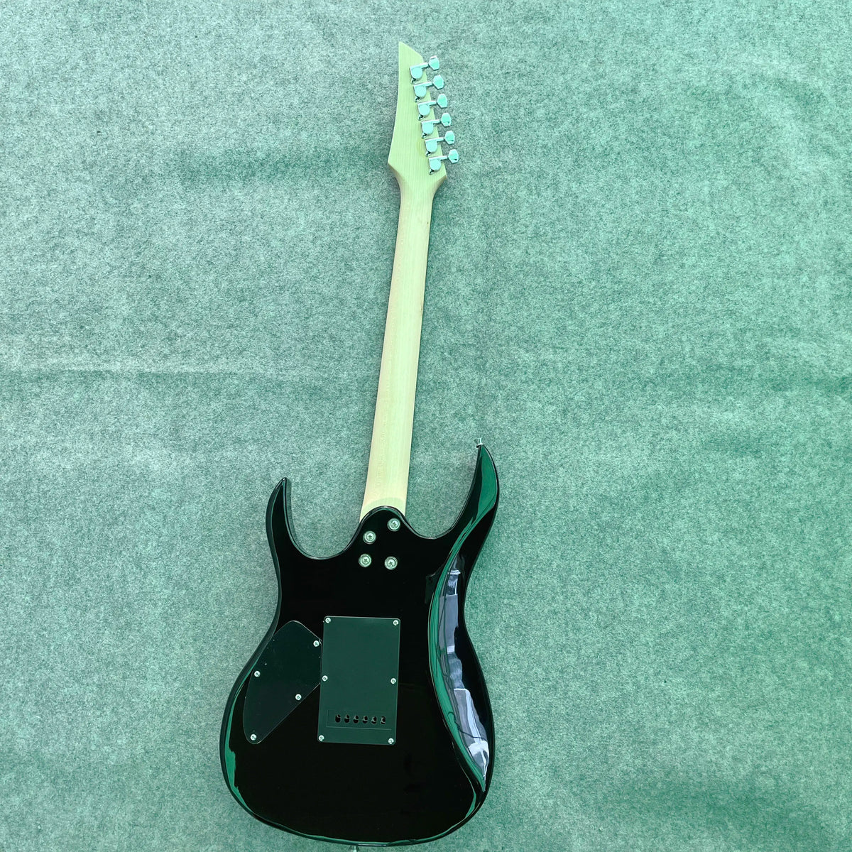 Estilo clásico 170 Guitarra eléctrica Círculo negro Guitarra plateada Práctica de rendimiento profesional