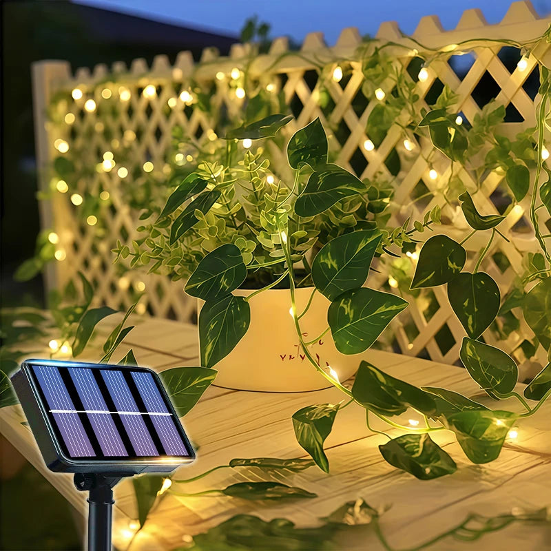 Guirnalda de 50/100 luces LED verdes con hojas de hiedra artificial y energía solar, con 8 modos para decoración de jardines, bodas y Navidad