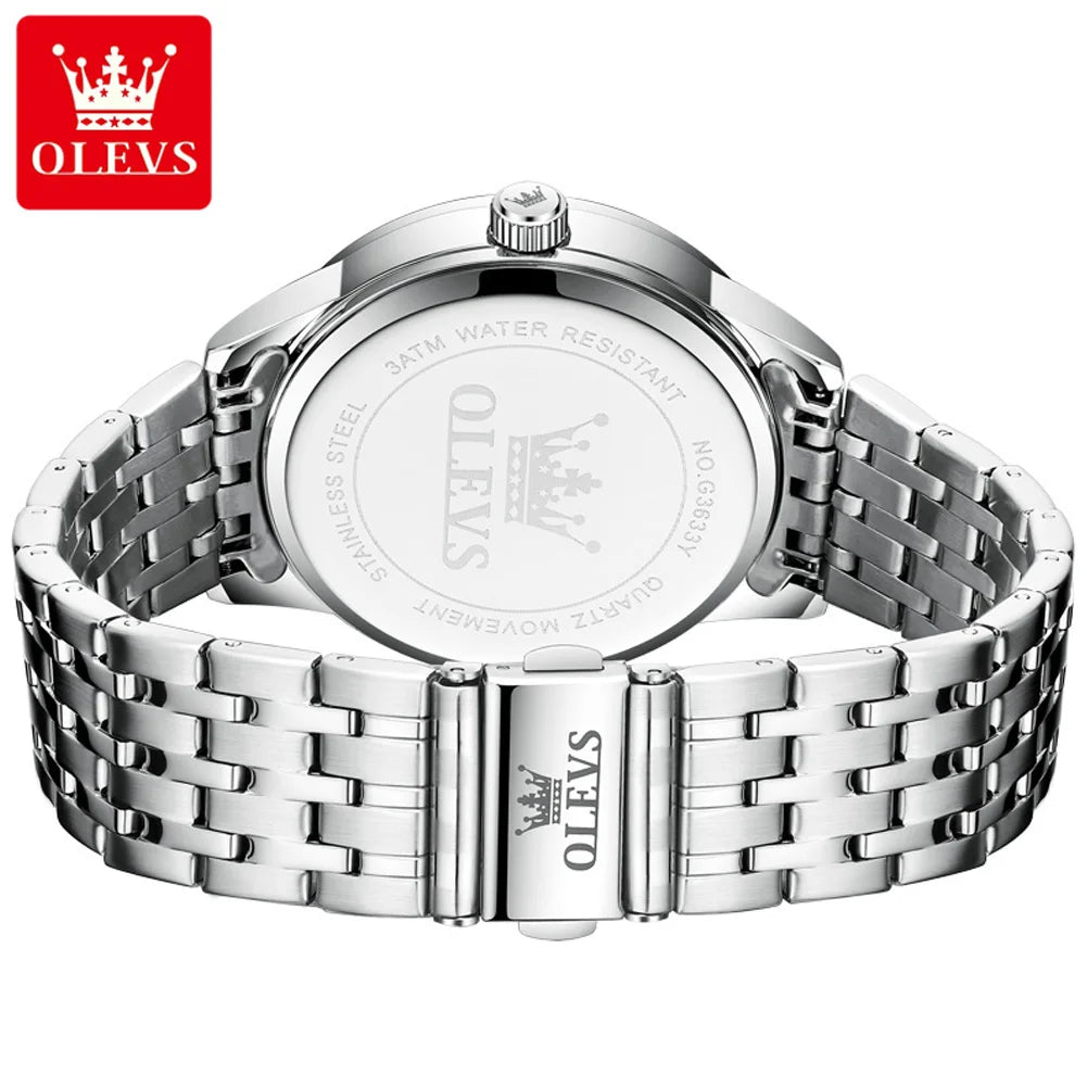 Reloj de cuarzo para hombre marca OLEVS, original y sencillo, resistente al agua, de acero inoxidable, con fecha, manecillas luminosas y números romanos.