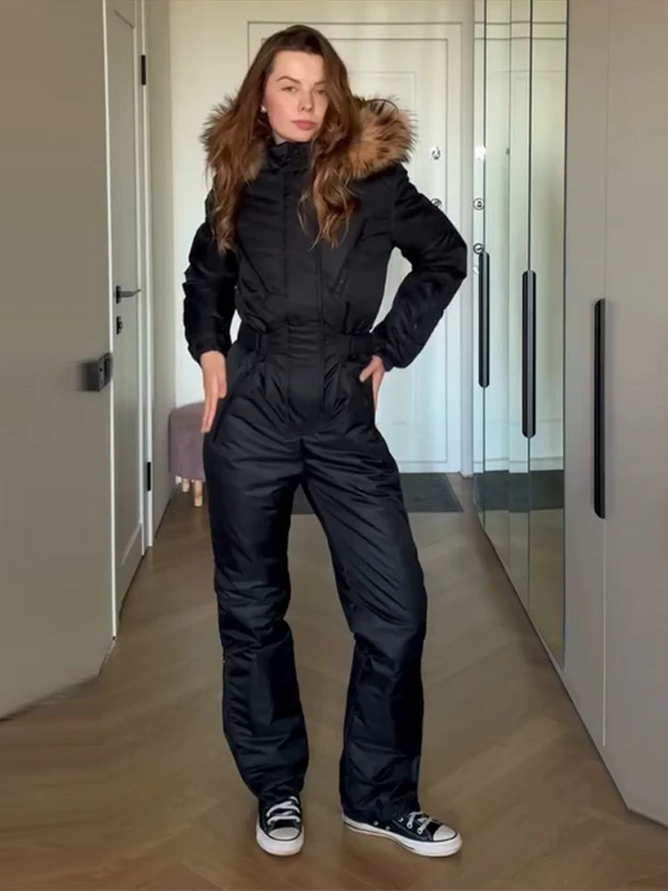 Elegante mono de esquí para mujer con capucha de piel, cremalleras gruesas y cintura ajustable, mono de esquí cálido para mujer, otoño-invierno 2026, nuevo.